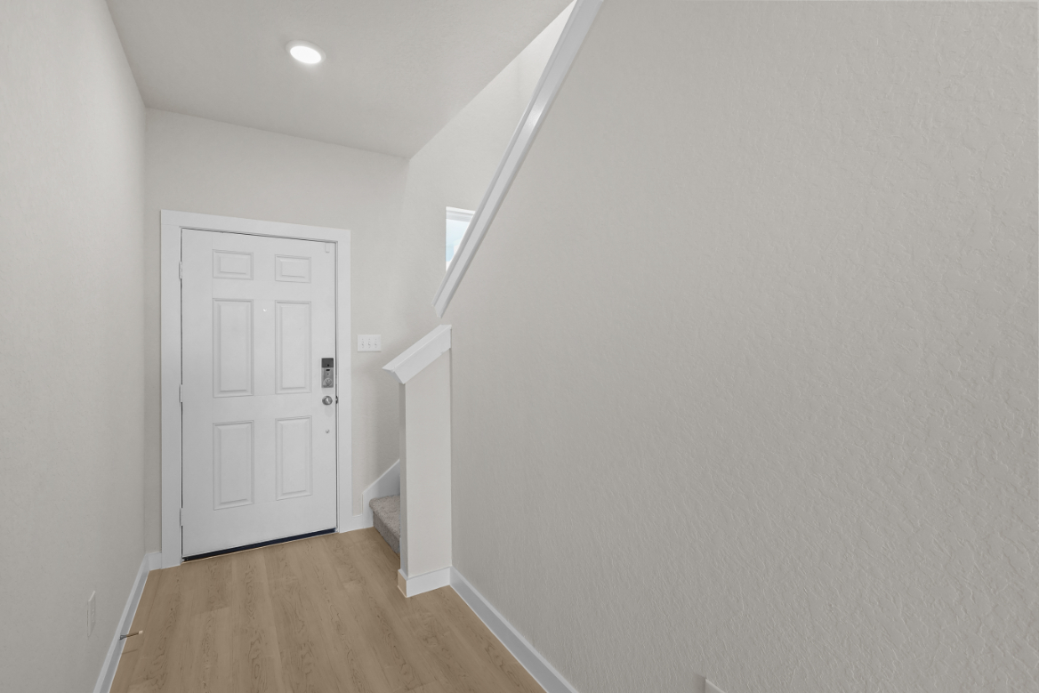 A white door in a room.