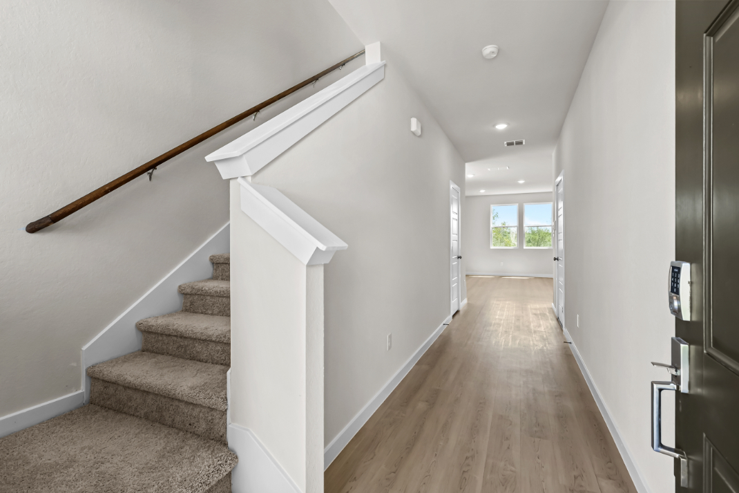 A staircase leading to a door.