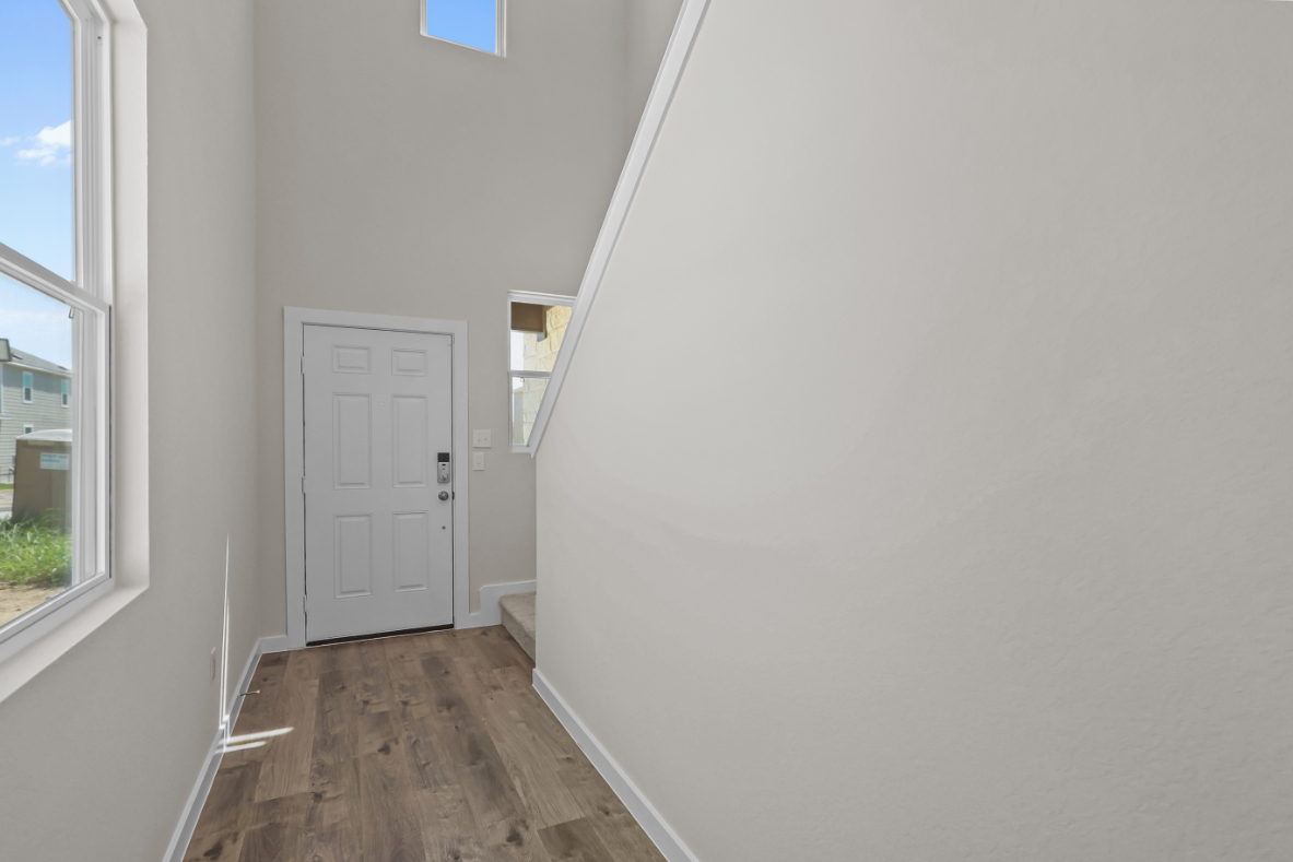 A white door in a room.