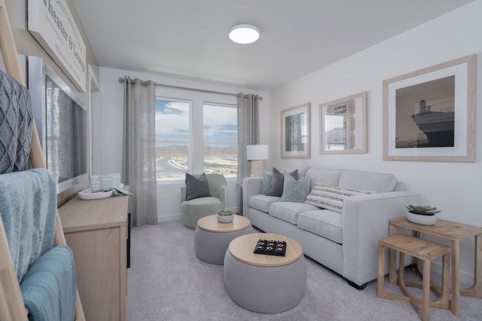 A living room with a large window.