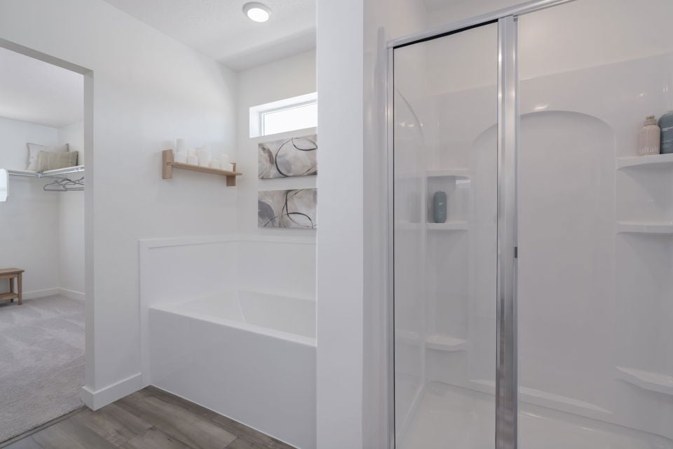 A bathroom with a glass shower.