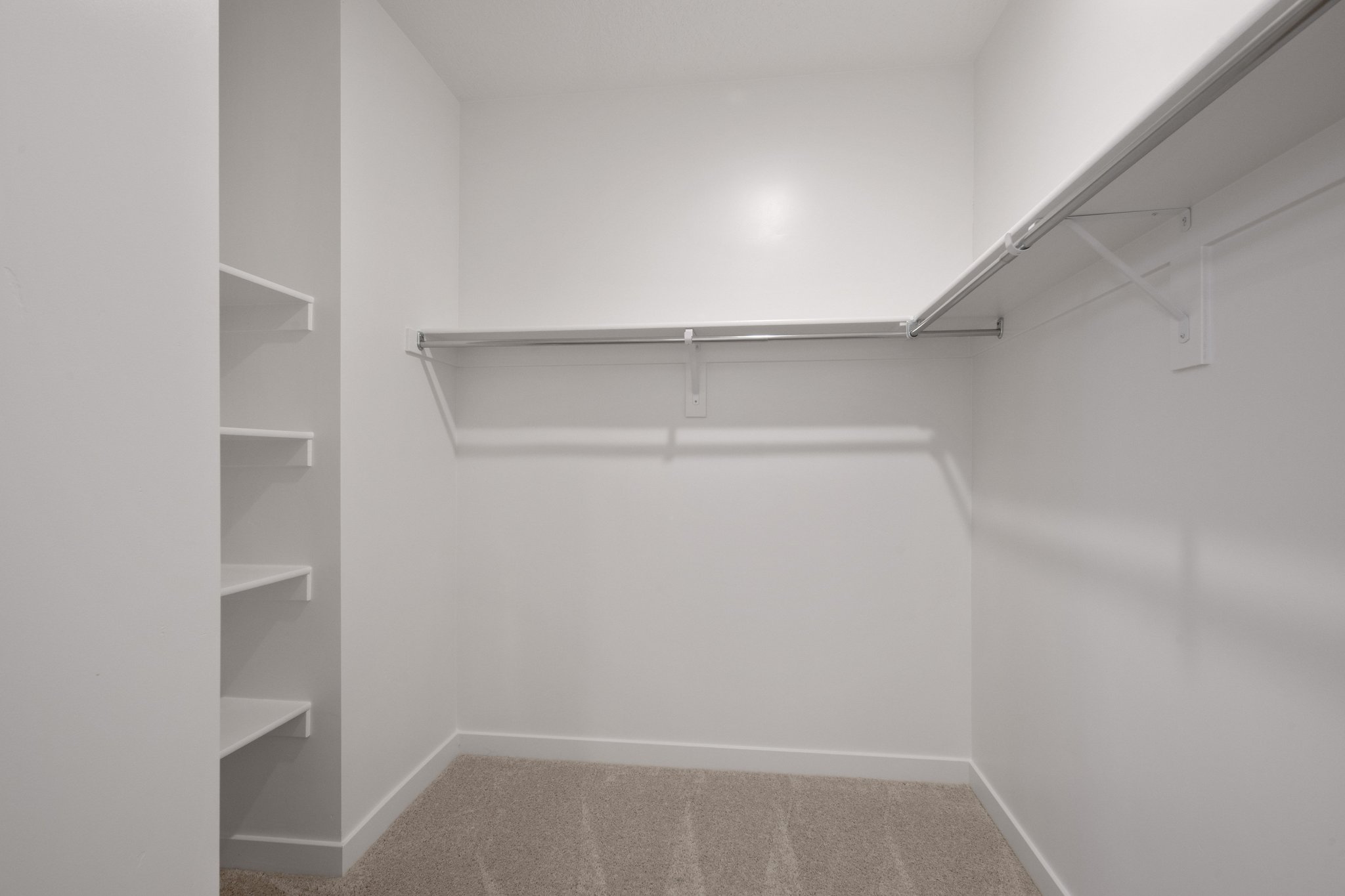 A white room with a white wall.