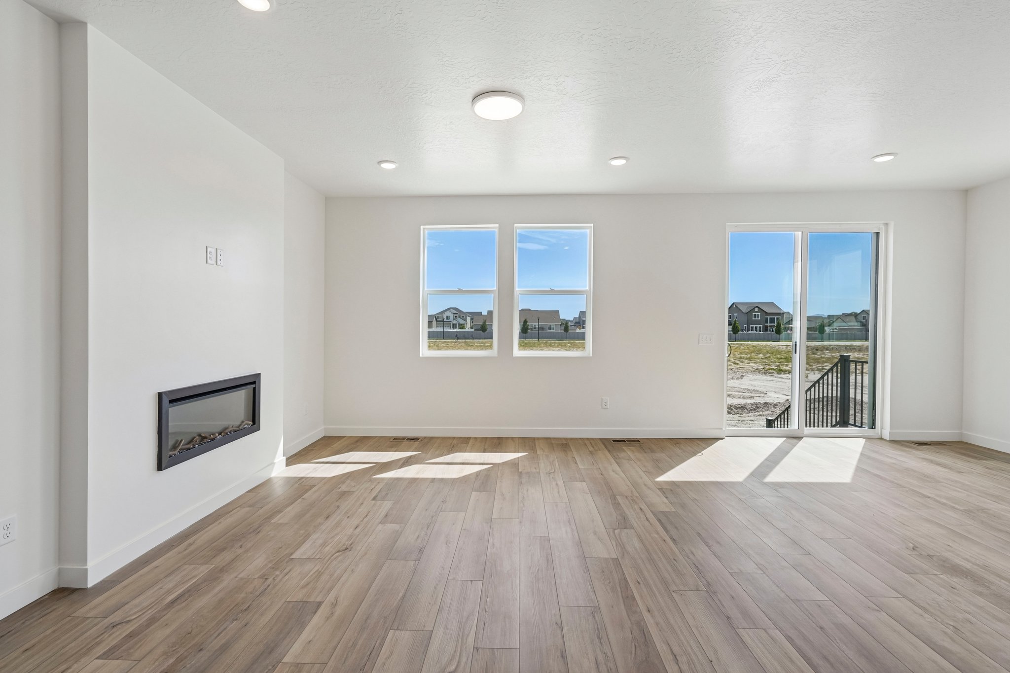 A room with a wood floor and a wood floor with a wood floor.