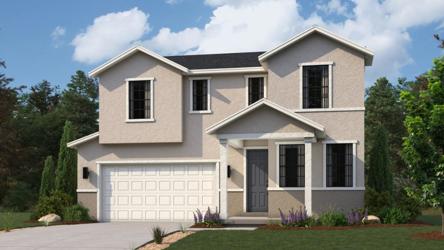 A white house with a driveway.