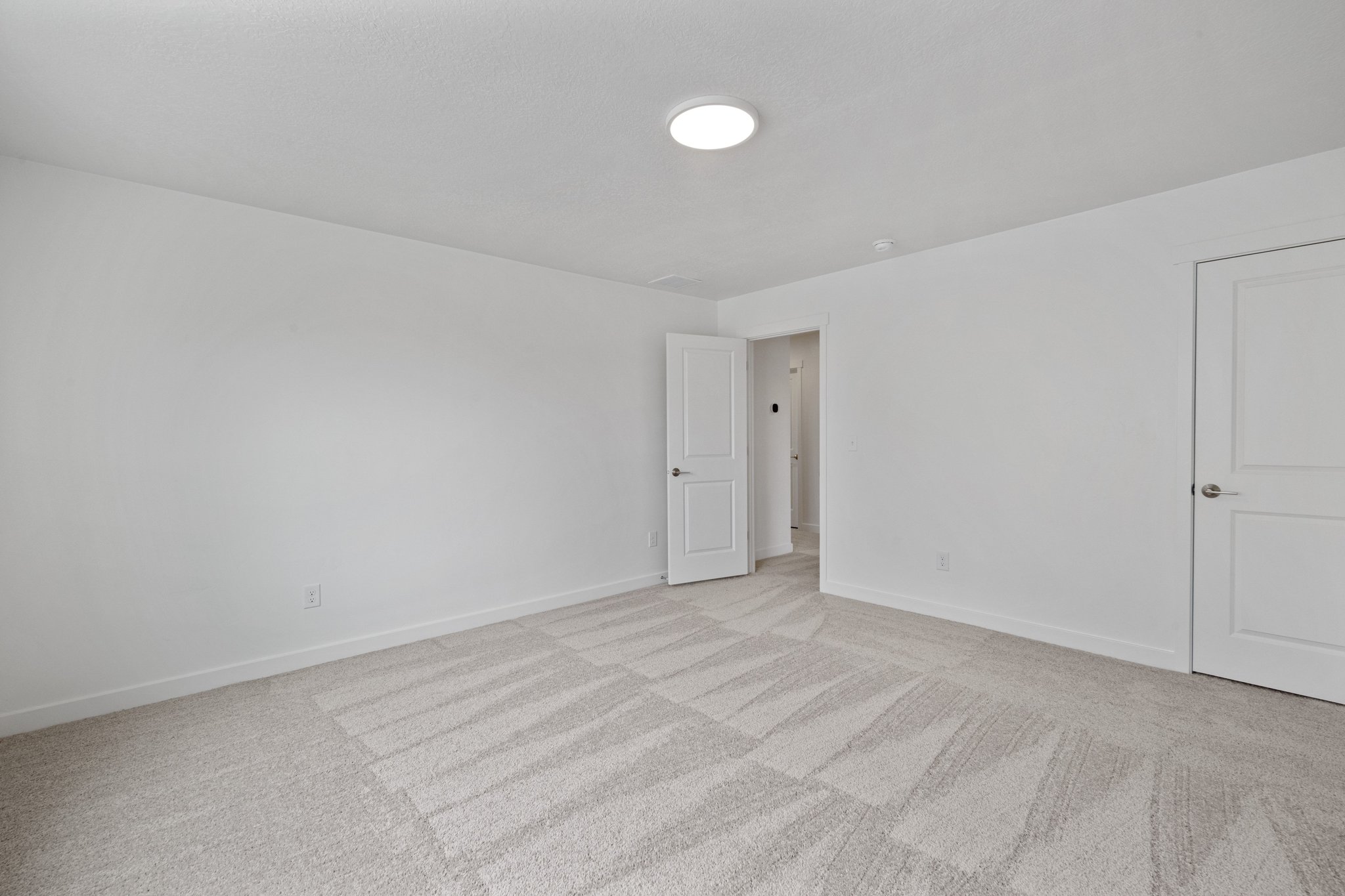 A room with white doors.