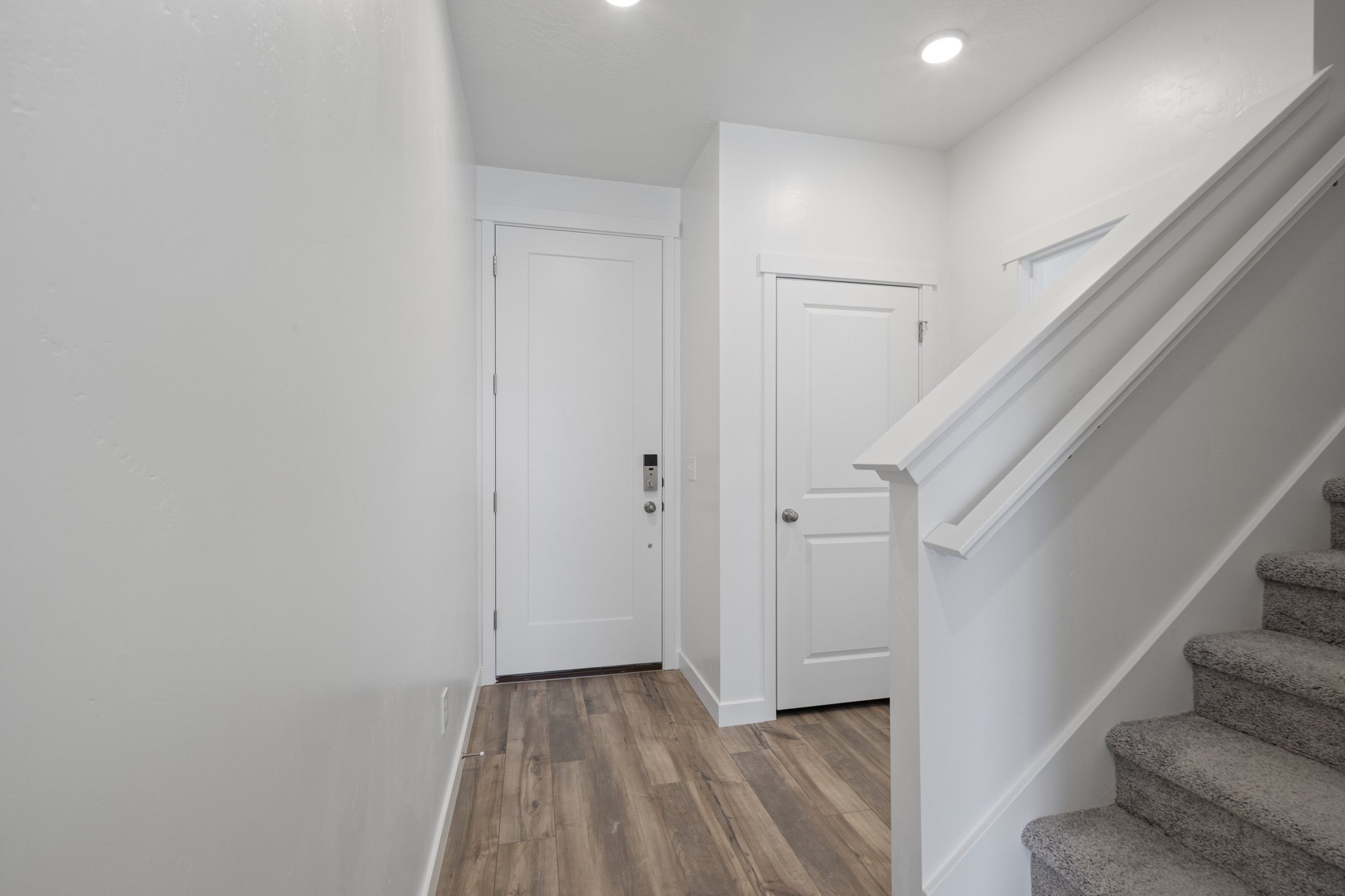 A staircase leading to a door.