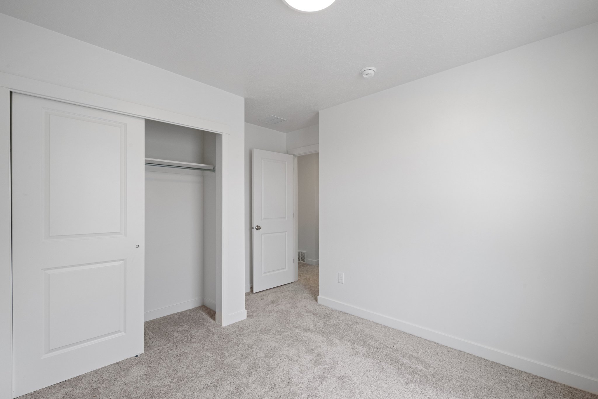 A room with white doors.