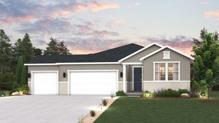 A house with a driveway and a lawn in front of it.