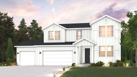 A white house with a driveway.