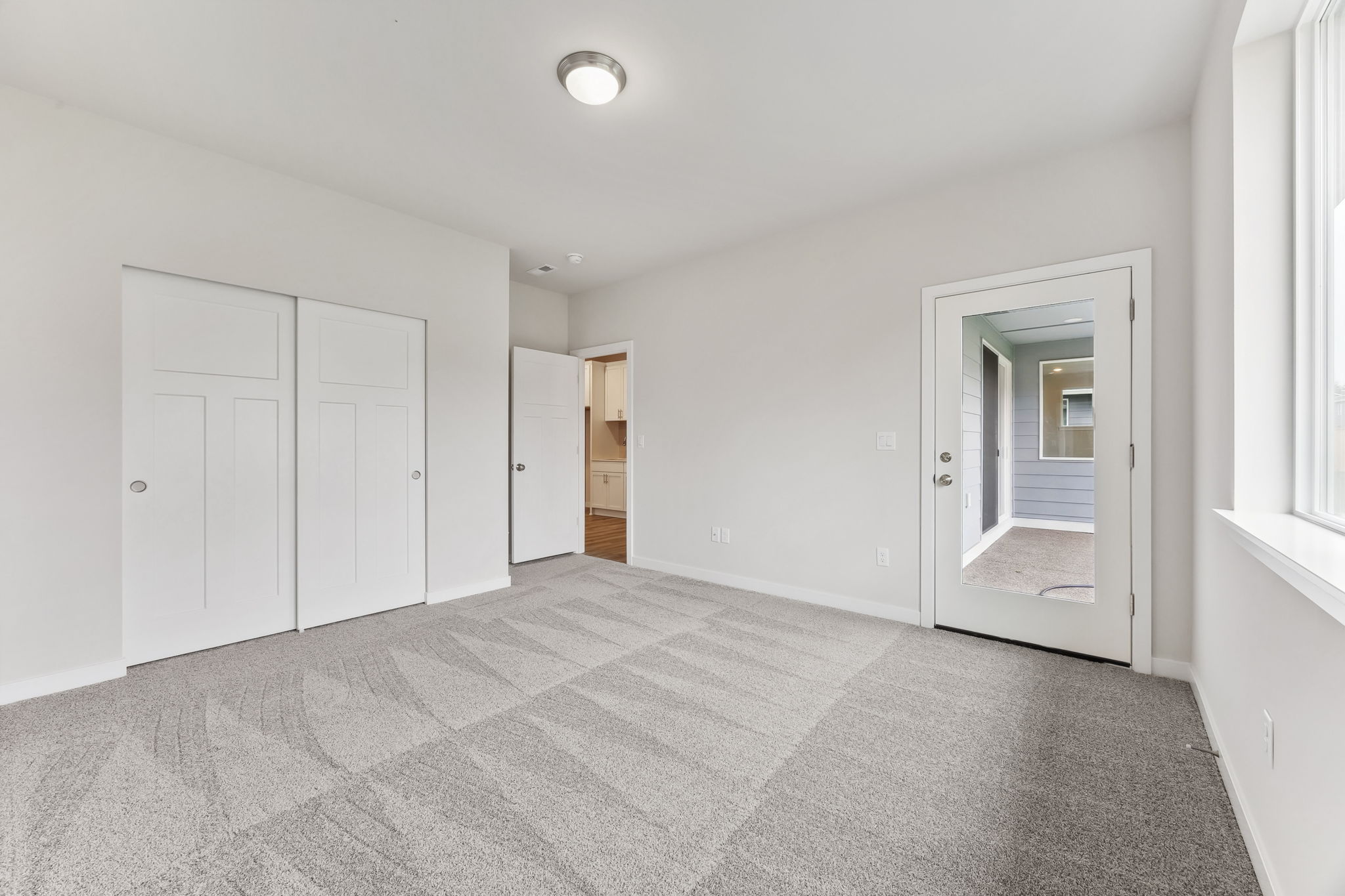 A room with white doors.