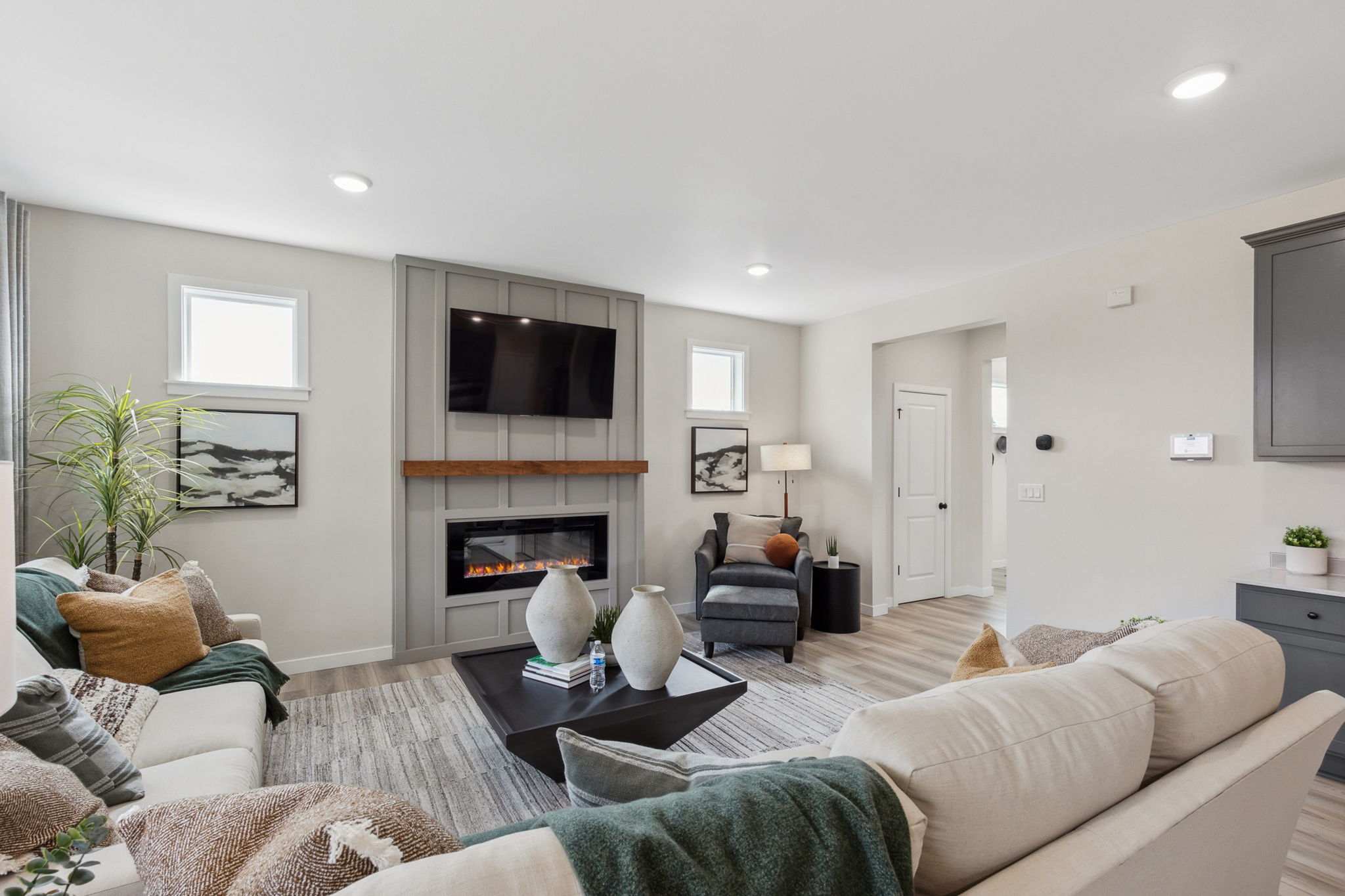 A living room with a fireplace.