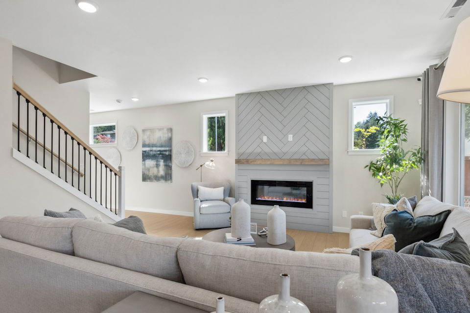 A living room with a fireplace.