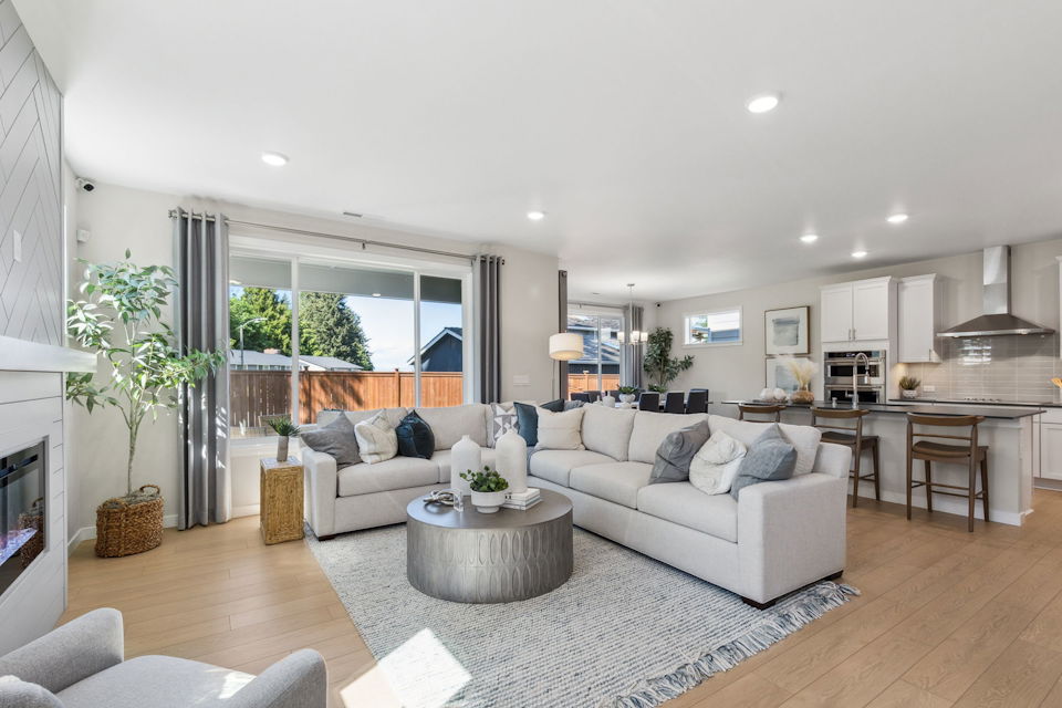 A living room with a large window.