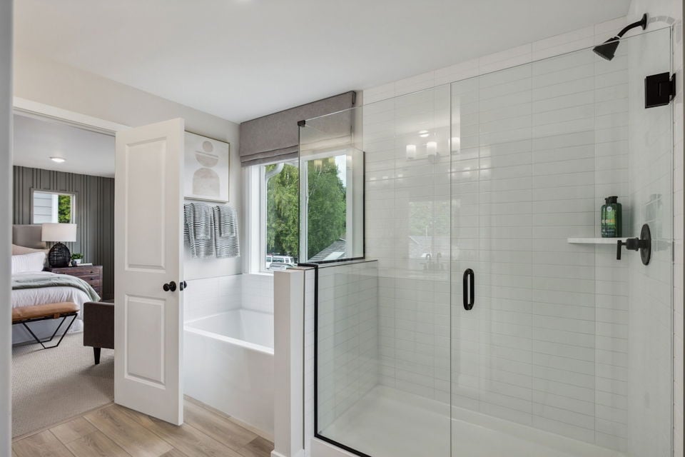 A bathroom with a glass shower.
