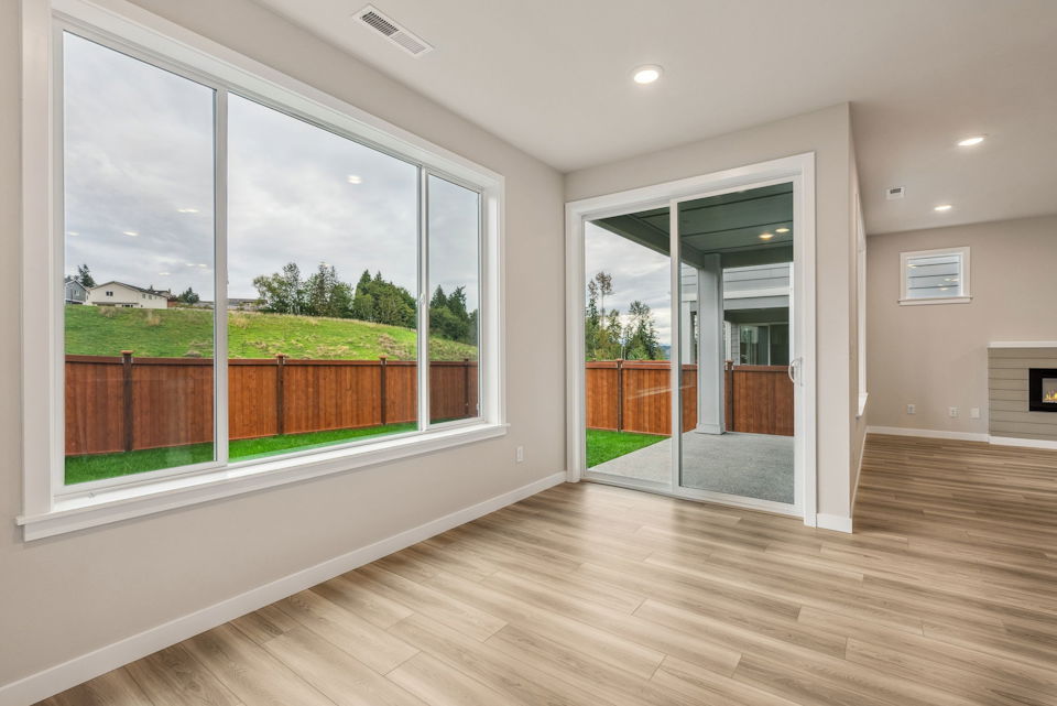A room with a large glass door.