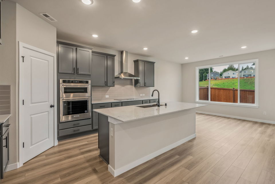 A kitchen with a large island.