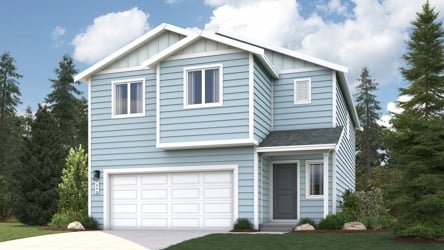 A blue house with a garage.