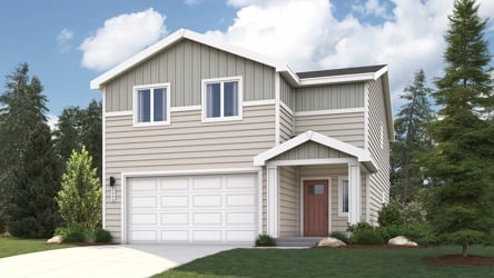 A white house with a garage.