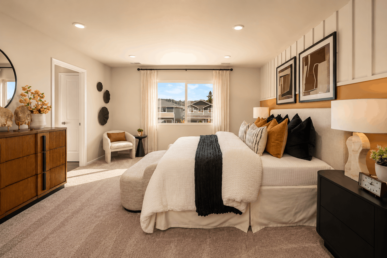 A bedroom with a bed and a window.
