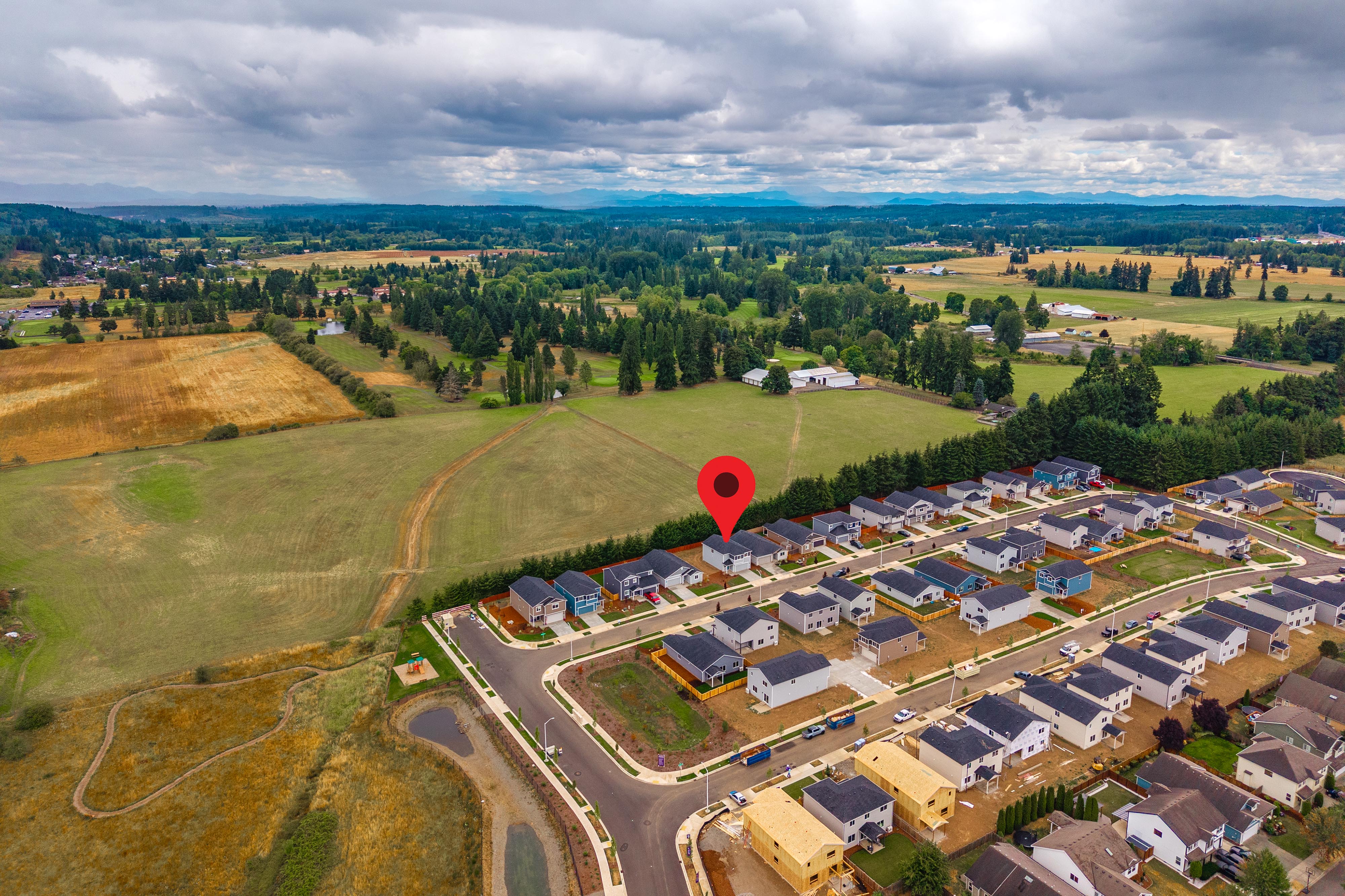 A hot air balloon flying over a town.