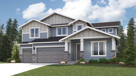 A house with a lawn in front of it.