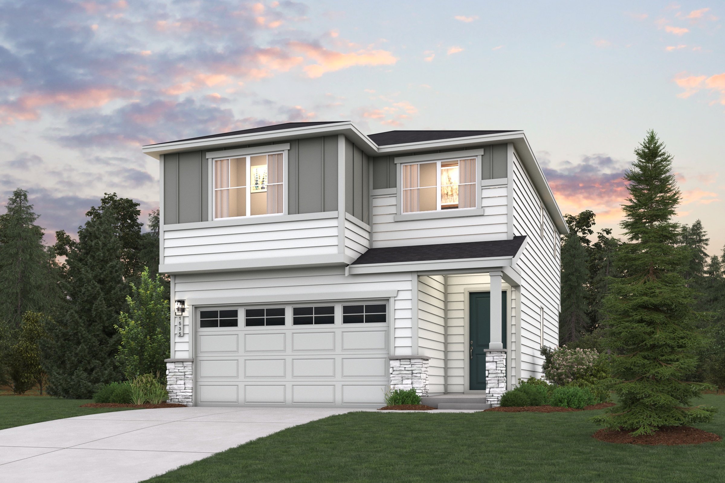 A house with a garage and trees around it.