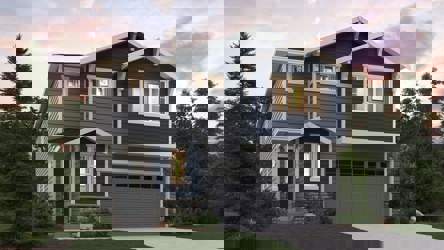 A house with a garage with Graceland in the background.