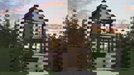 A house with a driveway and trees.