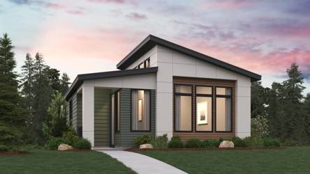 A house with a lawn and trees.