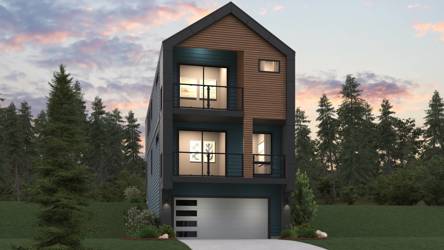 A house with a garage and trees around it.