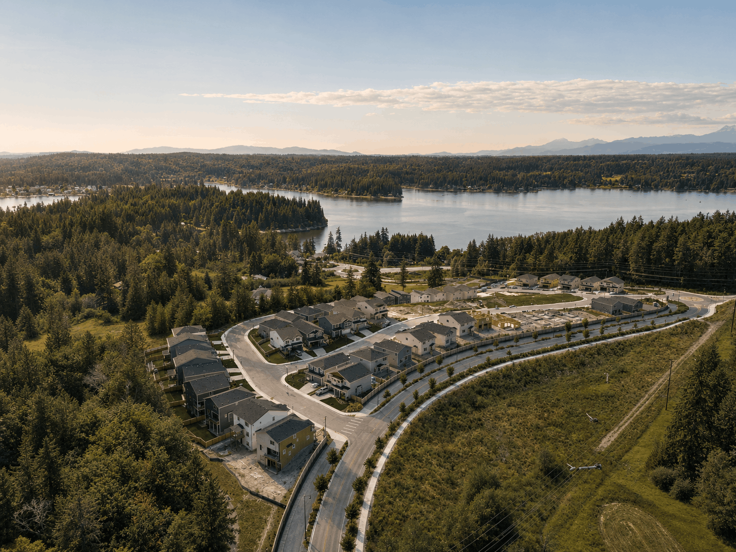 A river with a bridge and trees.