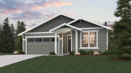 A house with a lawn in front of it.