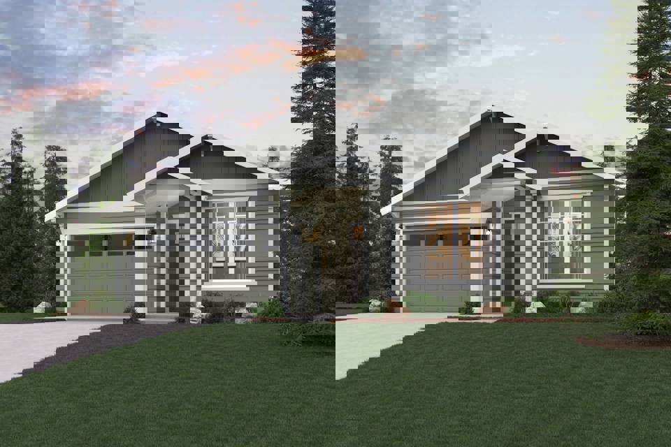A house with a lawn in front of it.