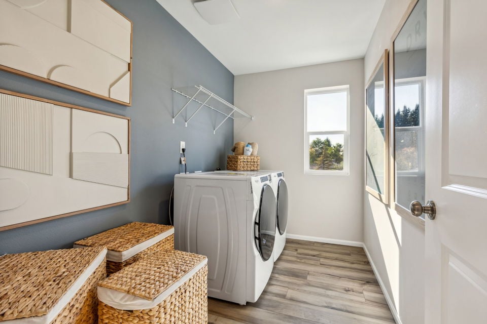 A room with a bed and a chair.