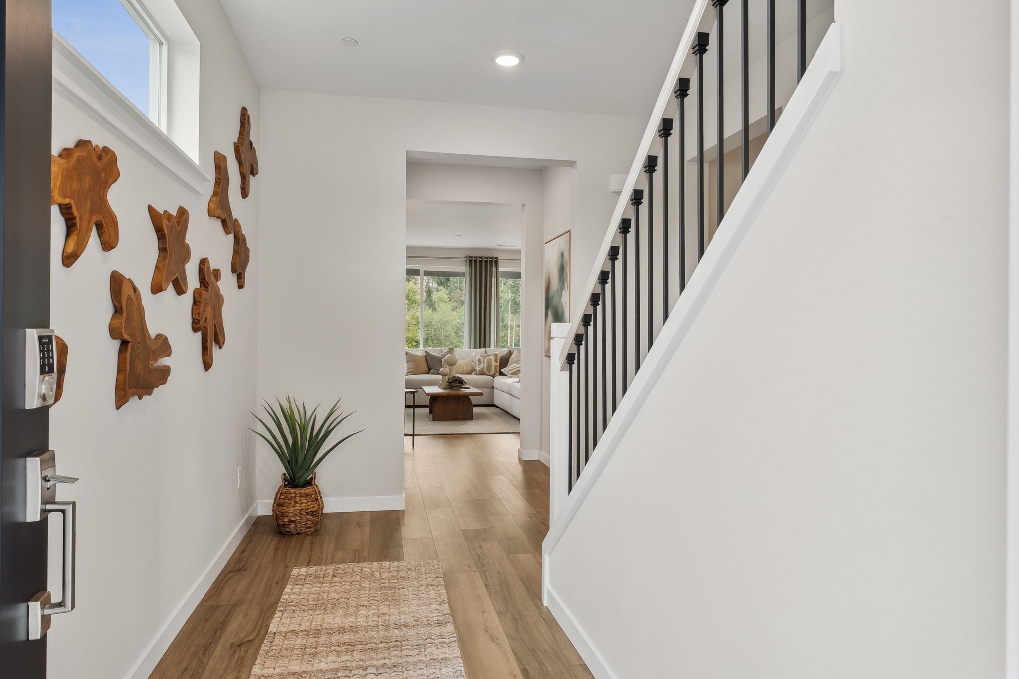 A hallway with white walls.