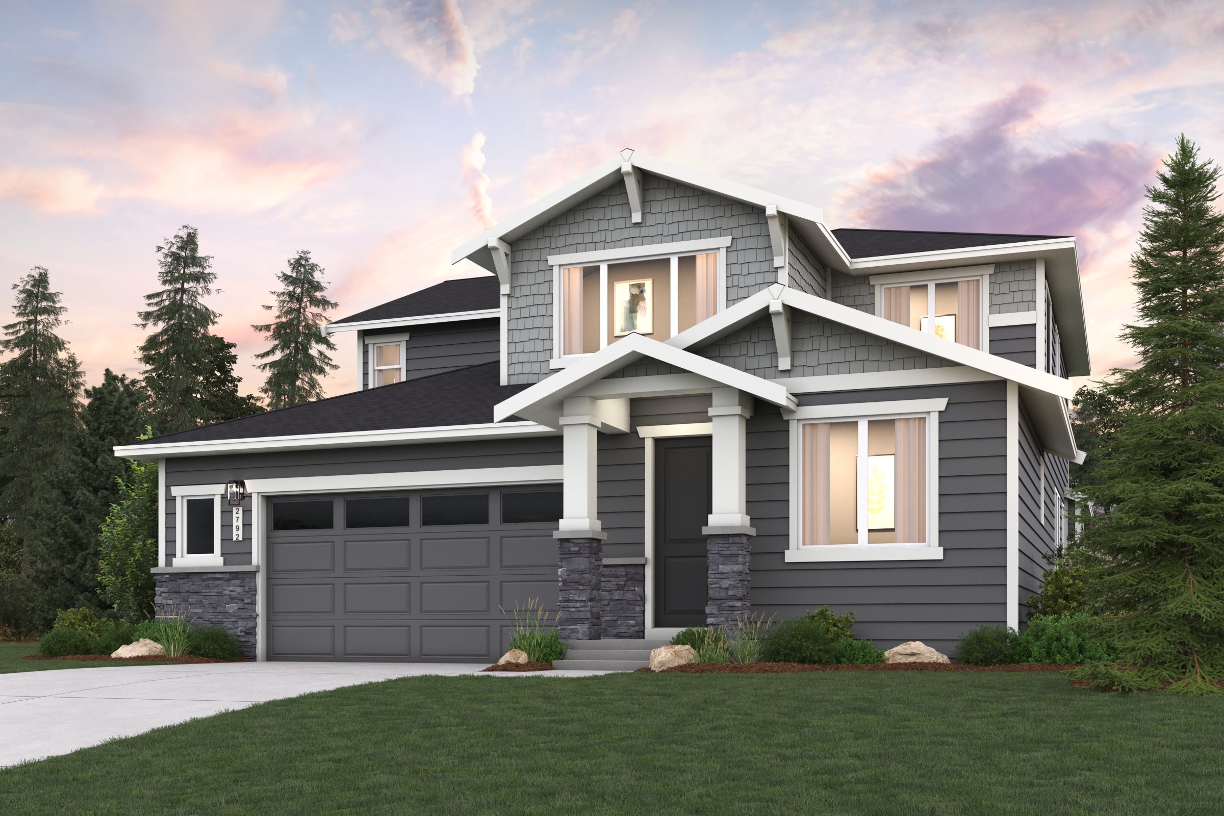 A house with a lawn in front of it.