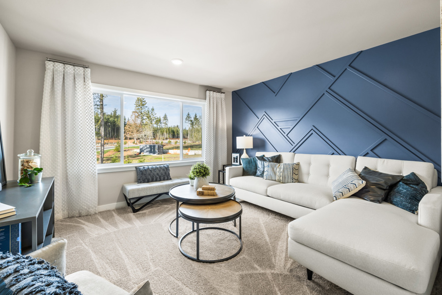 A living room with a large window.