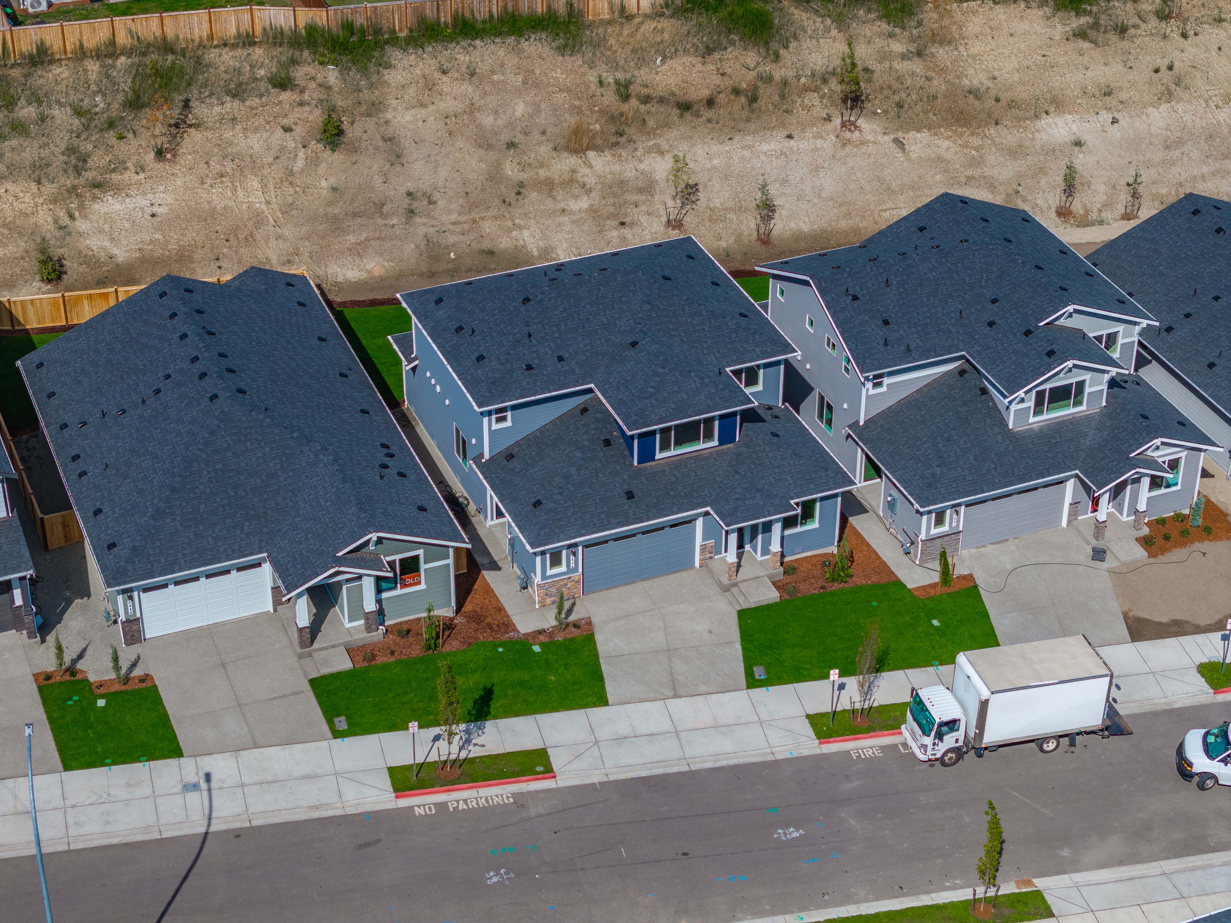 A house with a parking lot.