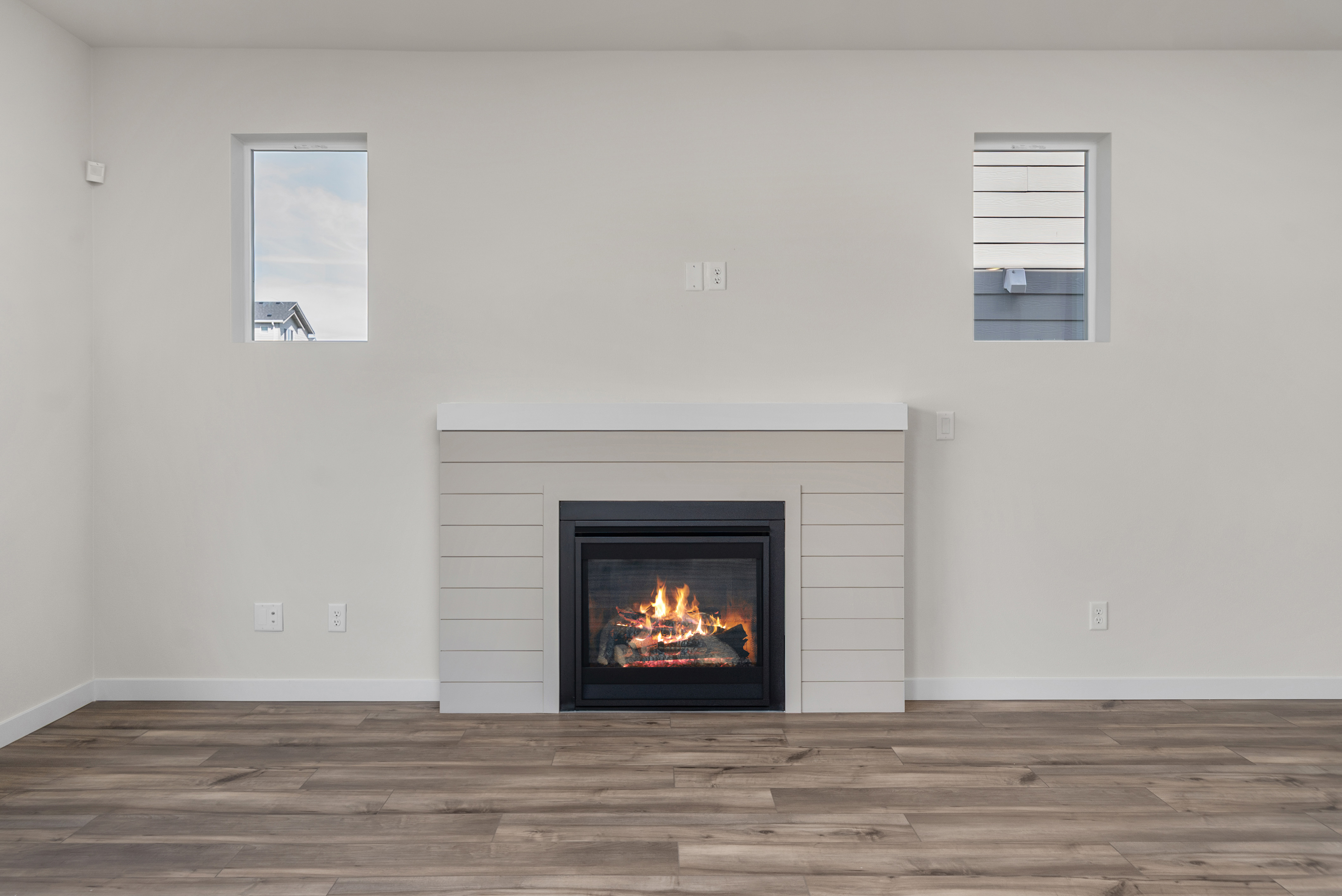 A fireplace in a room.