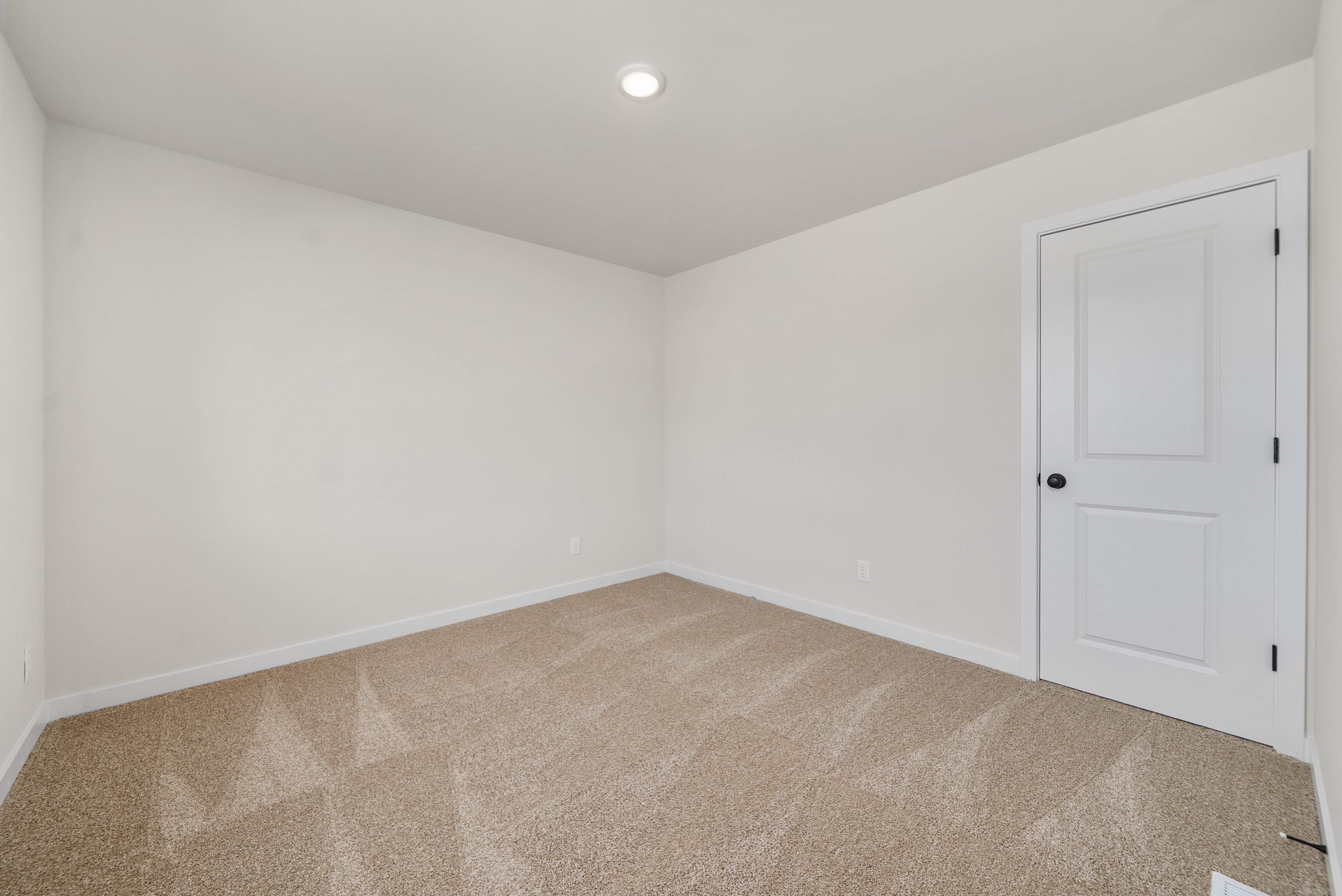 A room with white doors.