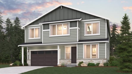 A house with a lawn in front of it.