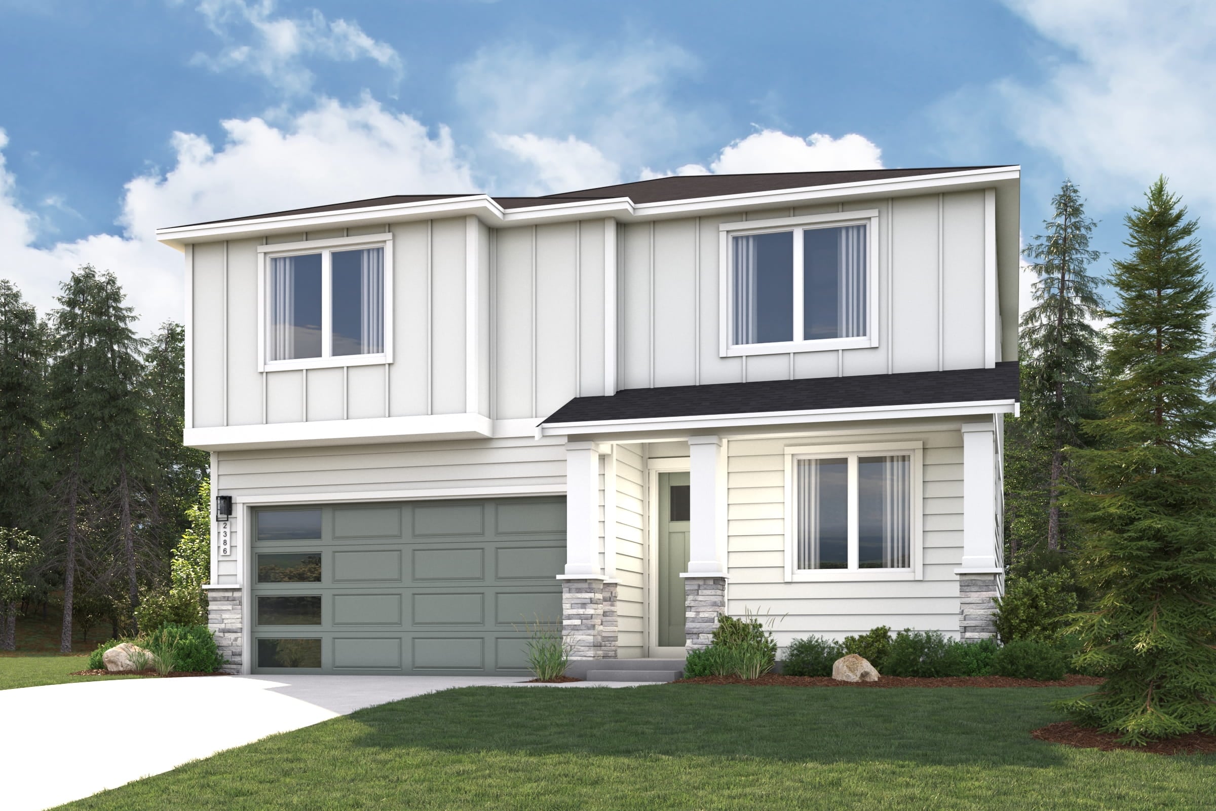 A white house with a garage.