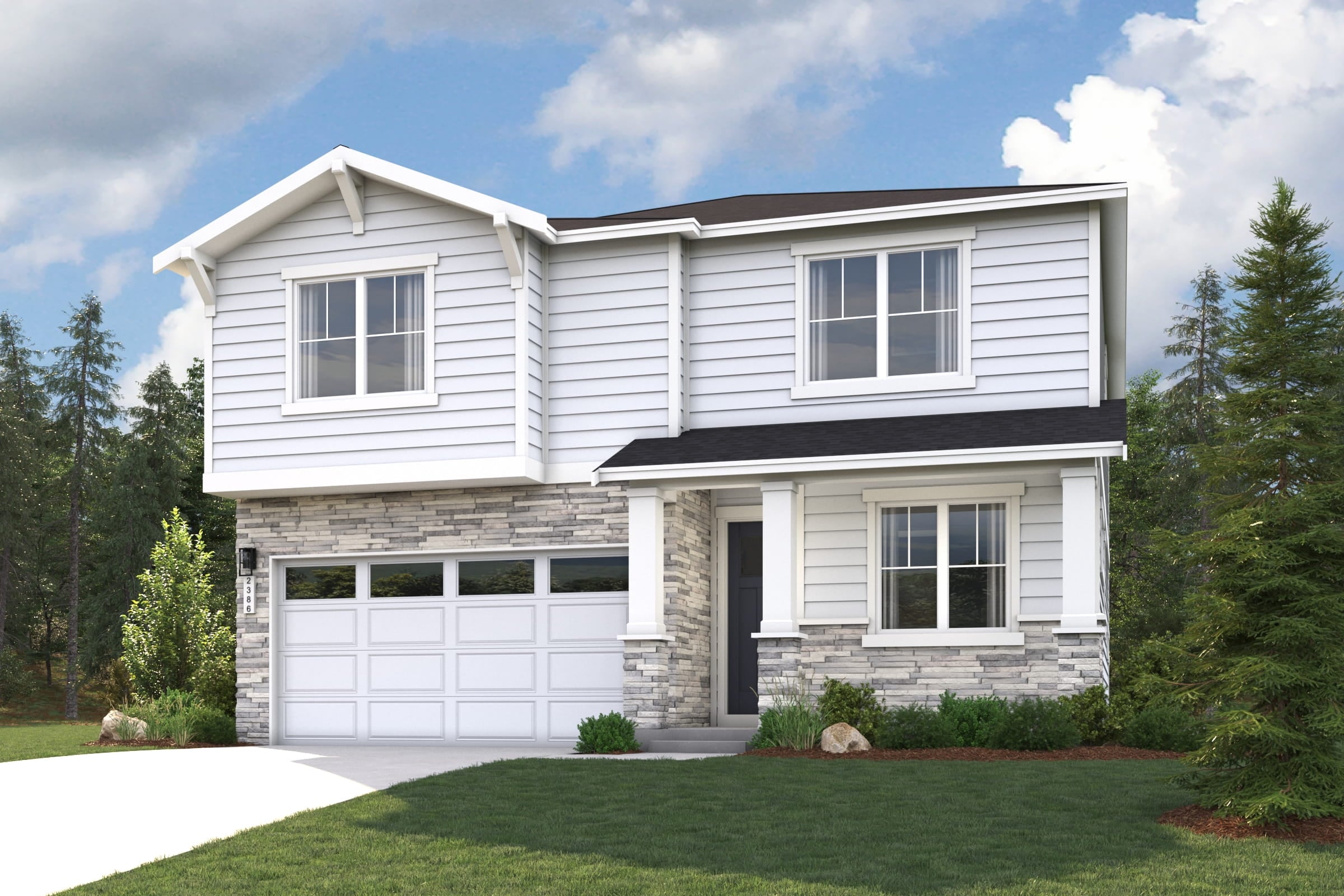 A white house with a garage.