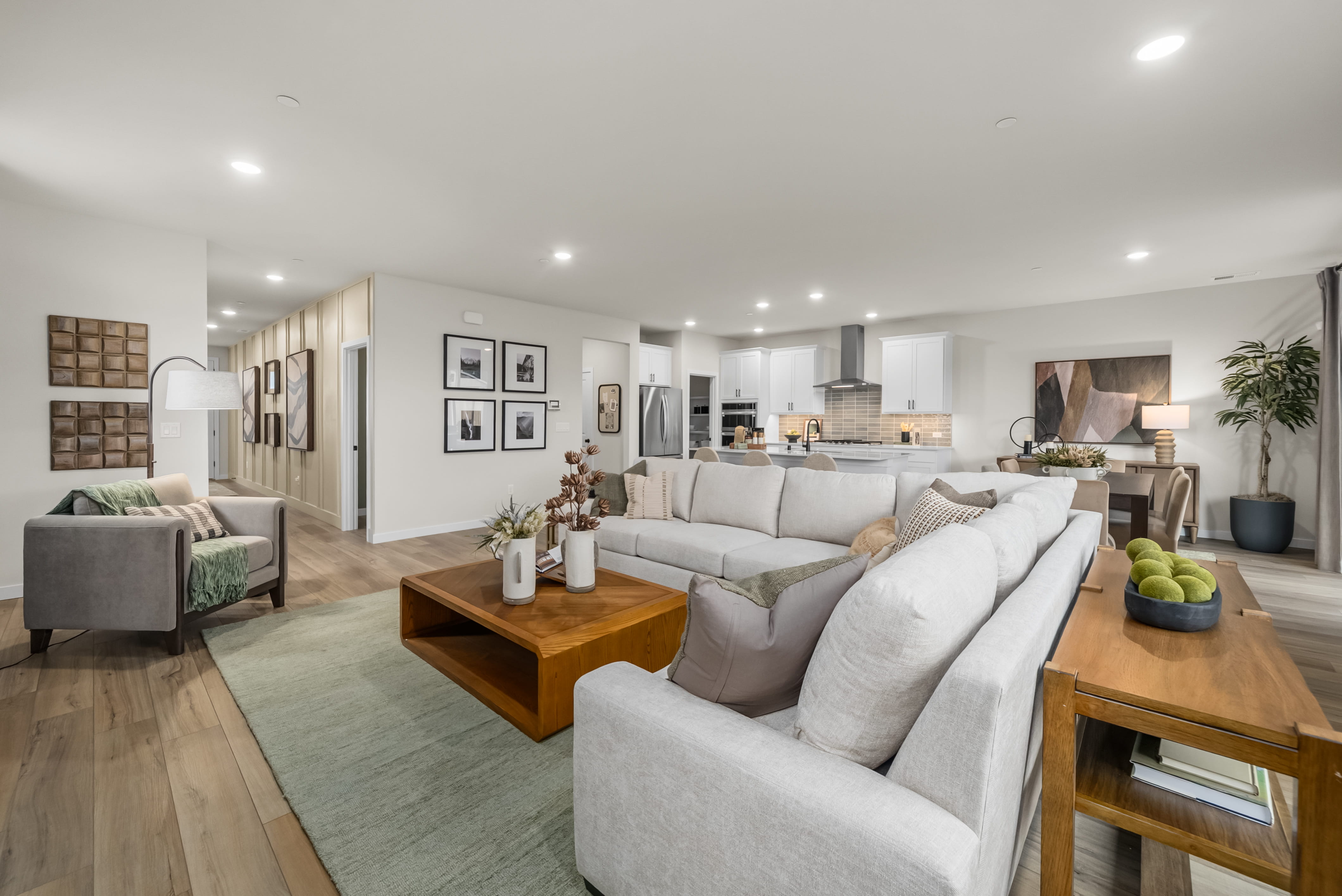A living room with a couch and a table.