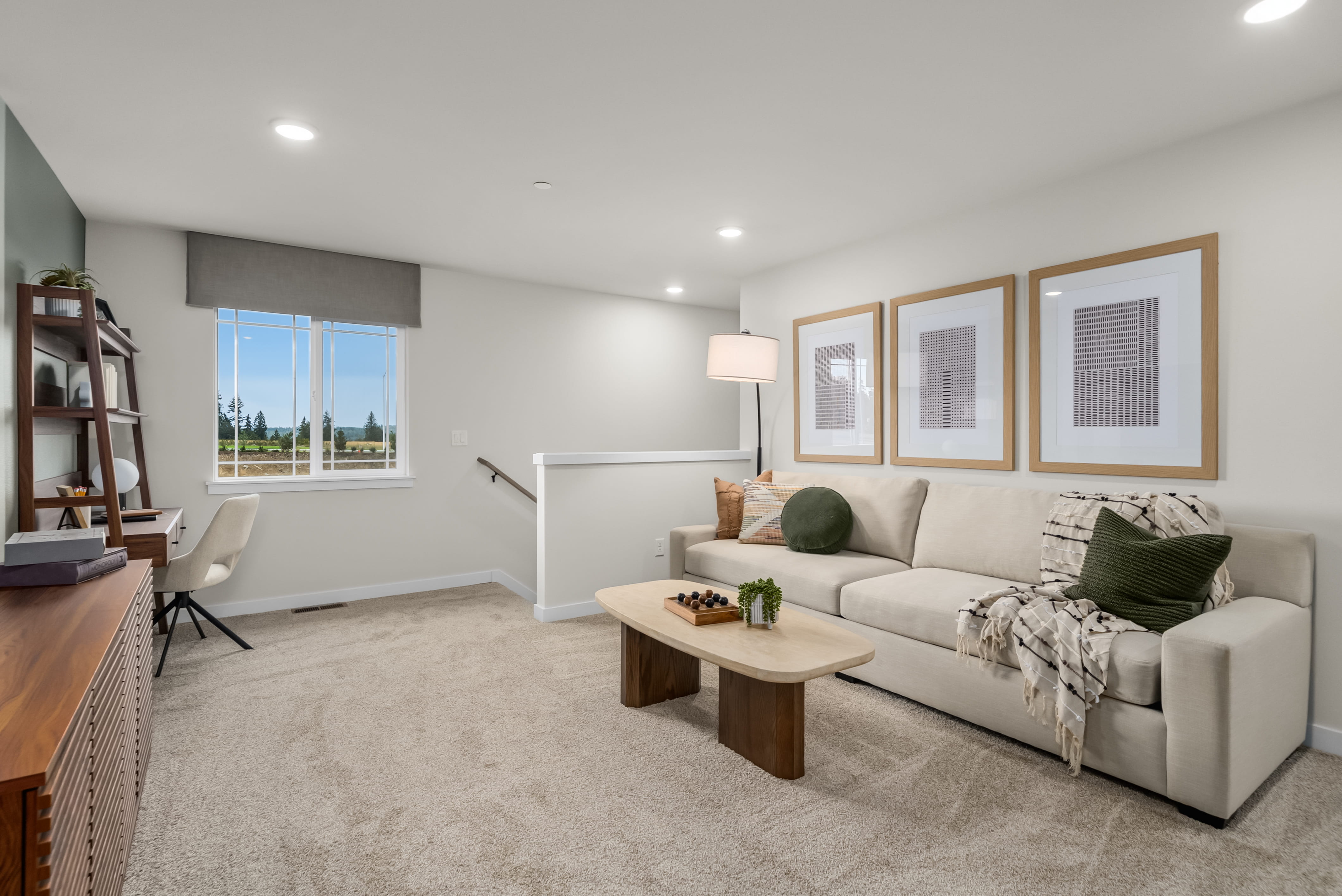 A living room with a white couch.