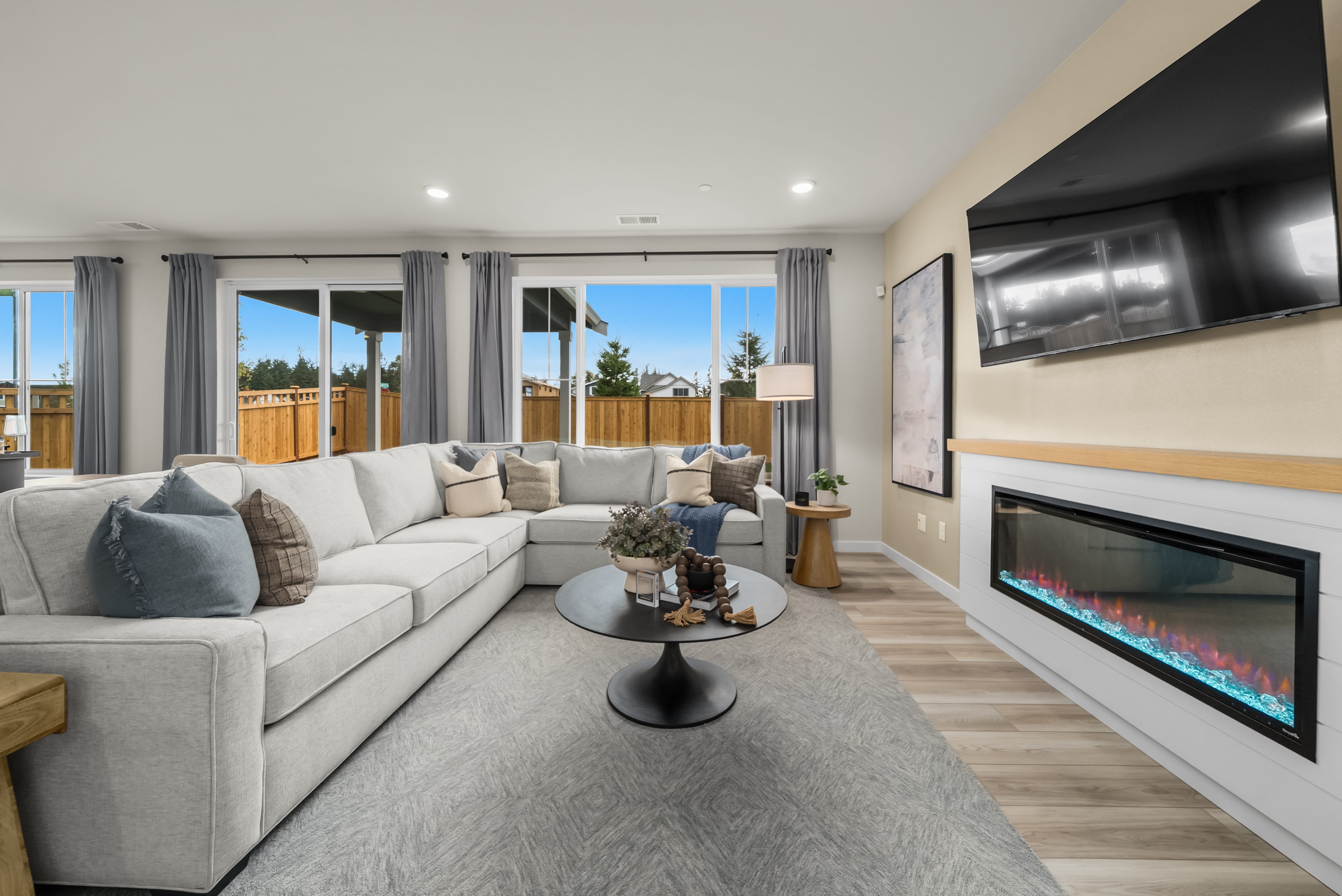 A living room with a fireplace.