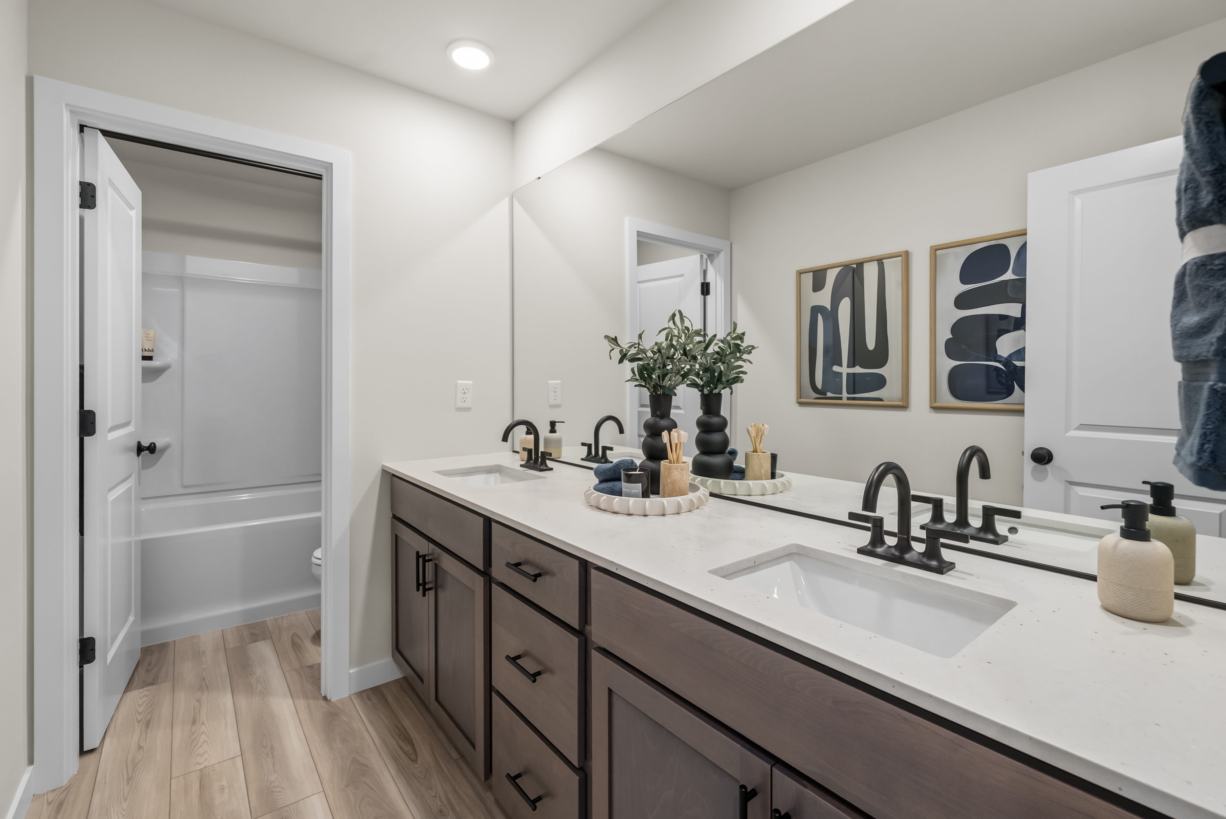 A bathroom with a sink and a bathtub.