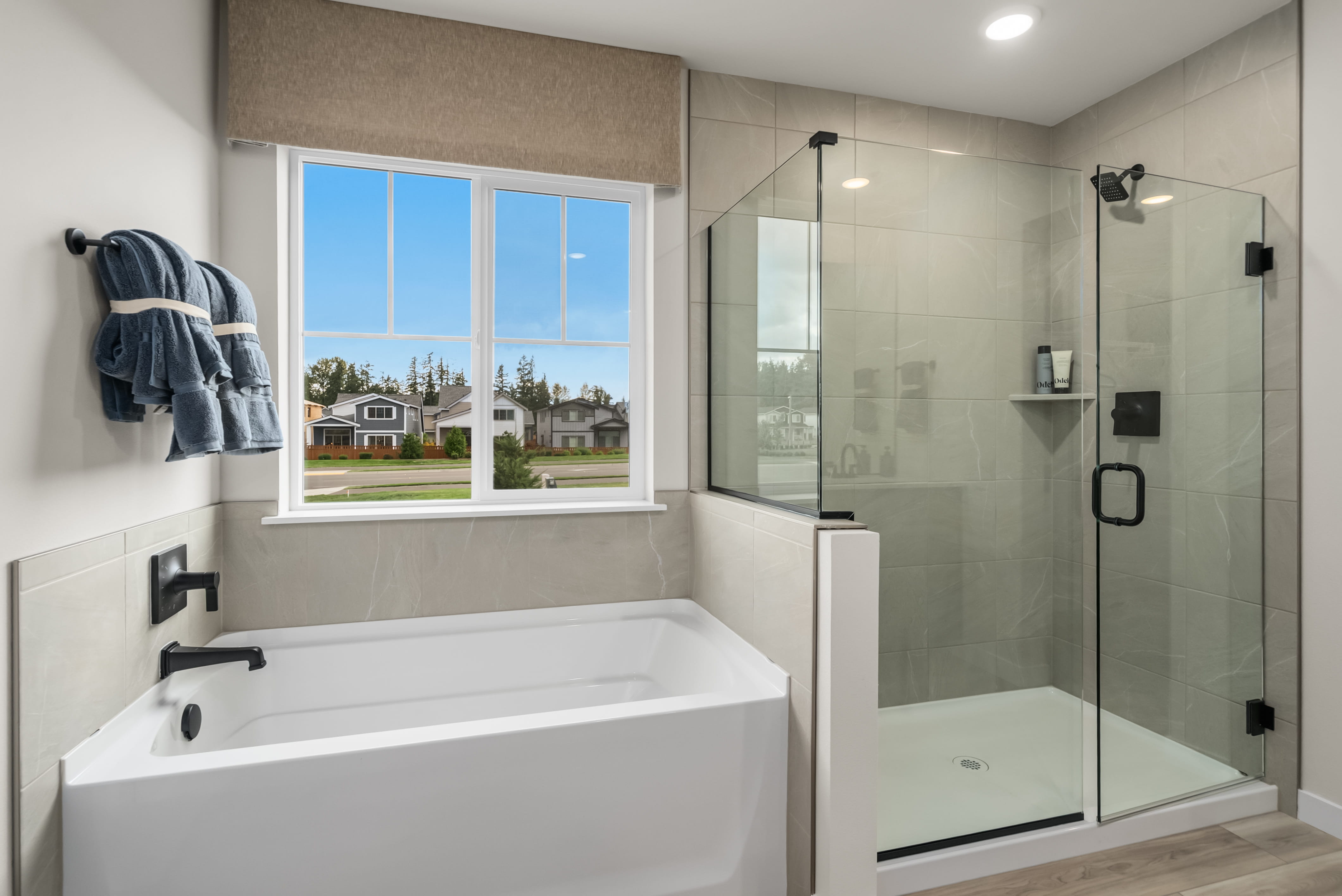 A bathroom with a glass shower.