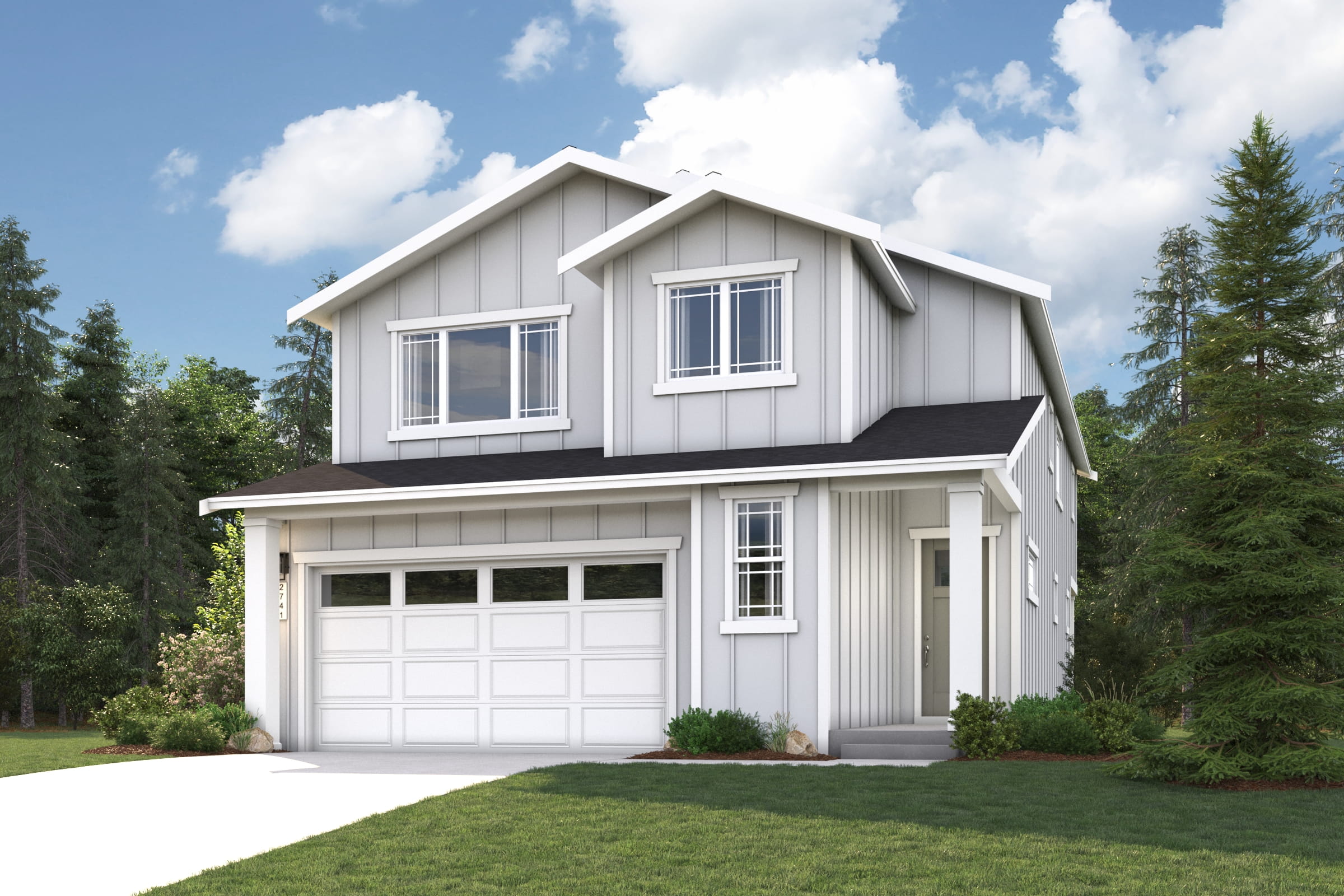 A white house with a garage.