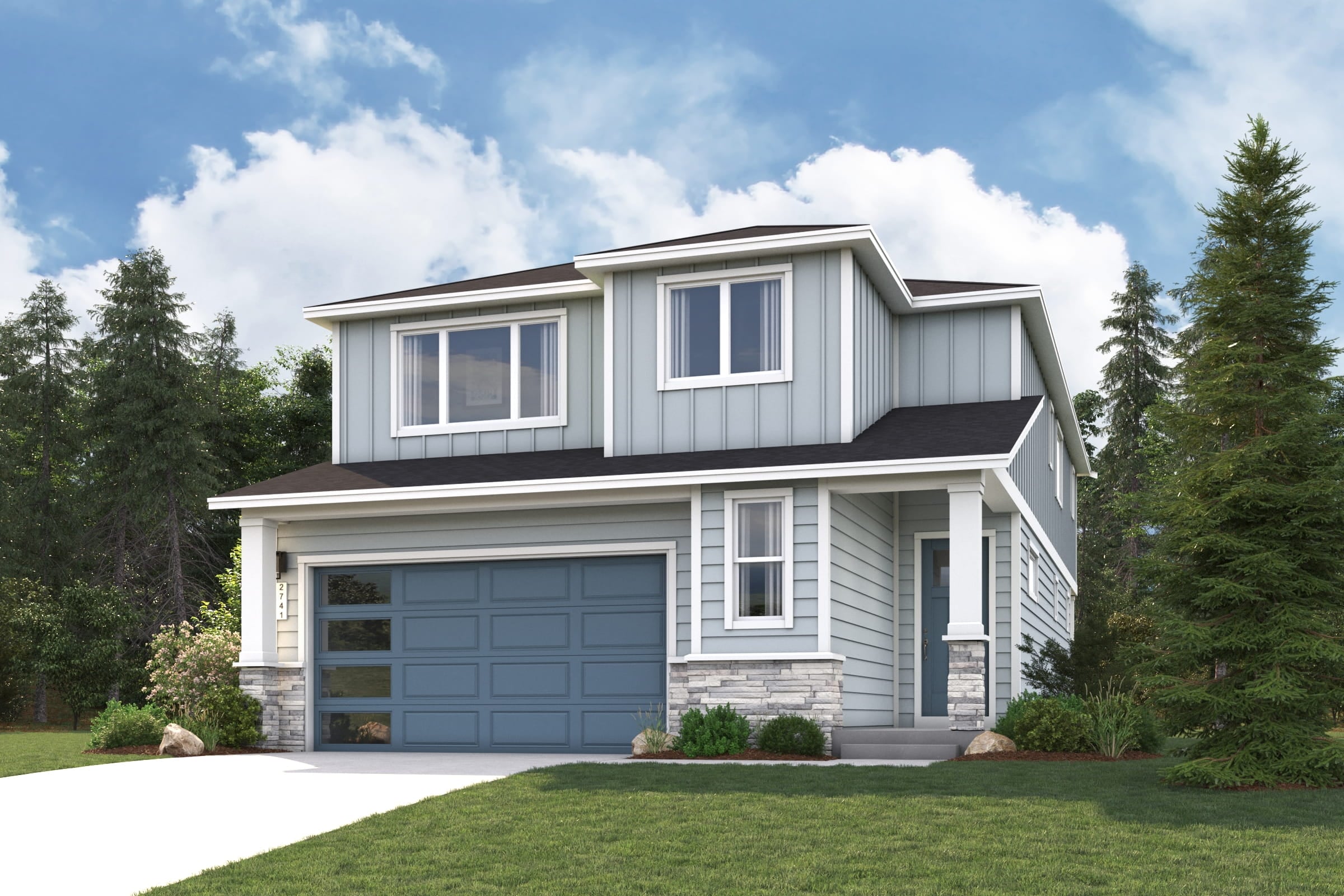 A house with a garage and trees in the back.